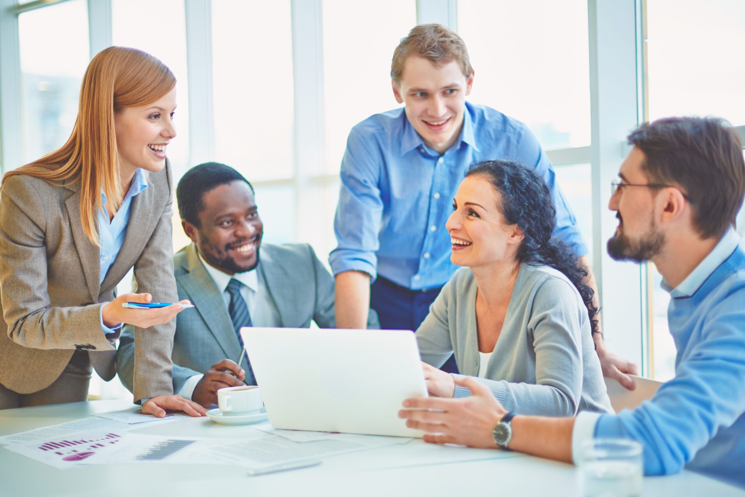executives-joking-laughing-office leadership training