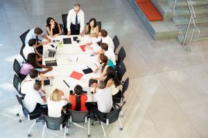 Team Meeting at Board Table